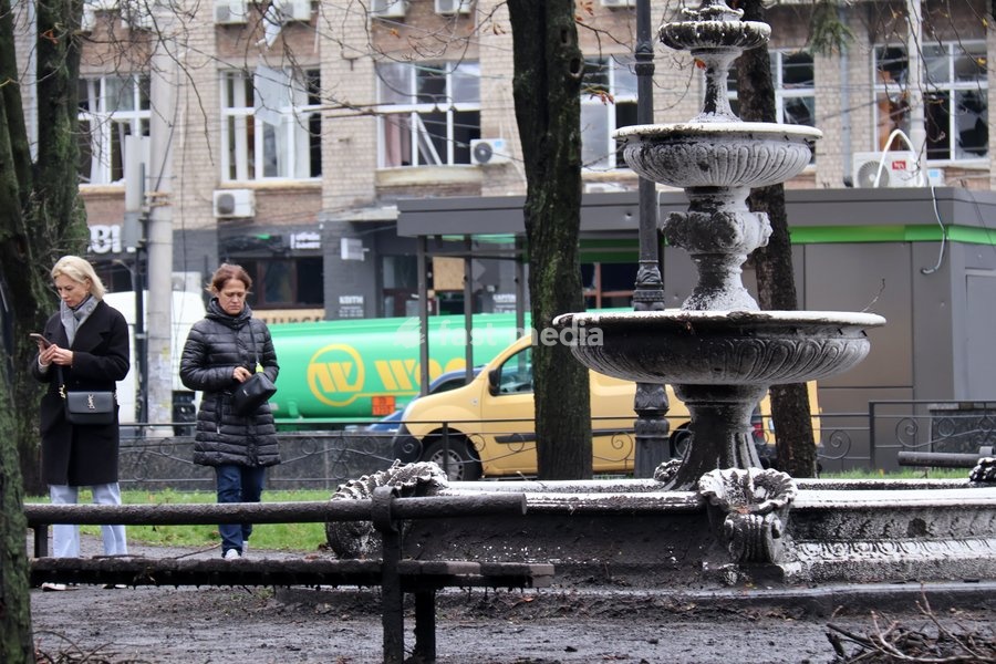 Two women stand by a fountain in the Solomianskyi district damaged by a Russian attack in Kyiv, Ukraine, on October 19, 2026. During the night and morning, Russia launched a massive strike on the capital using ballistic missiles, cruise missiles, and drones. According to Kyiv city head Vitali…