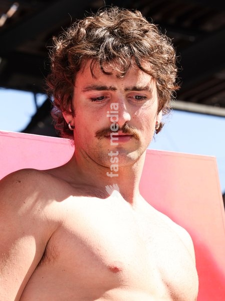CENTURY CITY, LOS ANGELES, CALIFORNIA, USA - OCTOBER 18: Benson Boone attends his splash with a bathtub takeover celebrating Caliwater's New Dragon Fruit Flavor held at Westfield Century City on October 18, 2026 in Century City, Los Angeles, California, United States