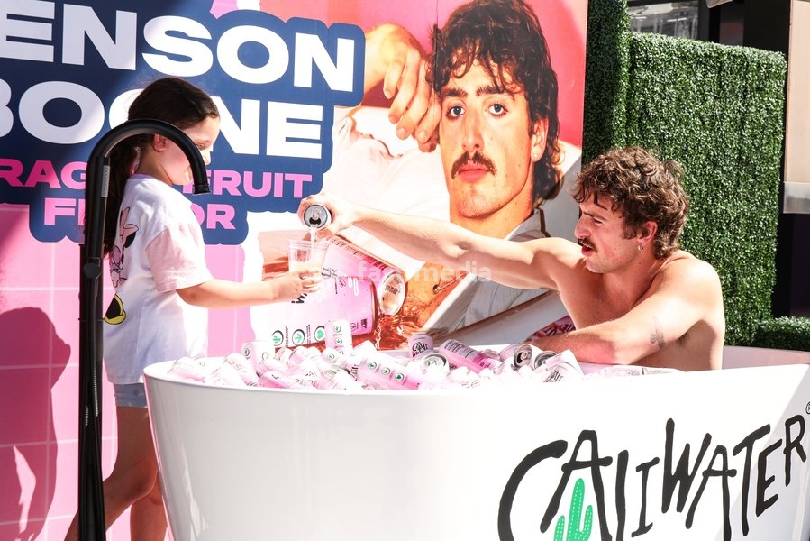 CENTURY CITY, LOS ANGELES, CALIFORNIA, USA - OCTOBER 18: Benson Boone attends his splash with a bathtub takeover celebrating Caliwater's New Dragon Fruit Flavor held at Westfield Century City on October 18, 2026 in Century City, Los Angeles, California, United States