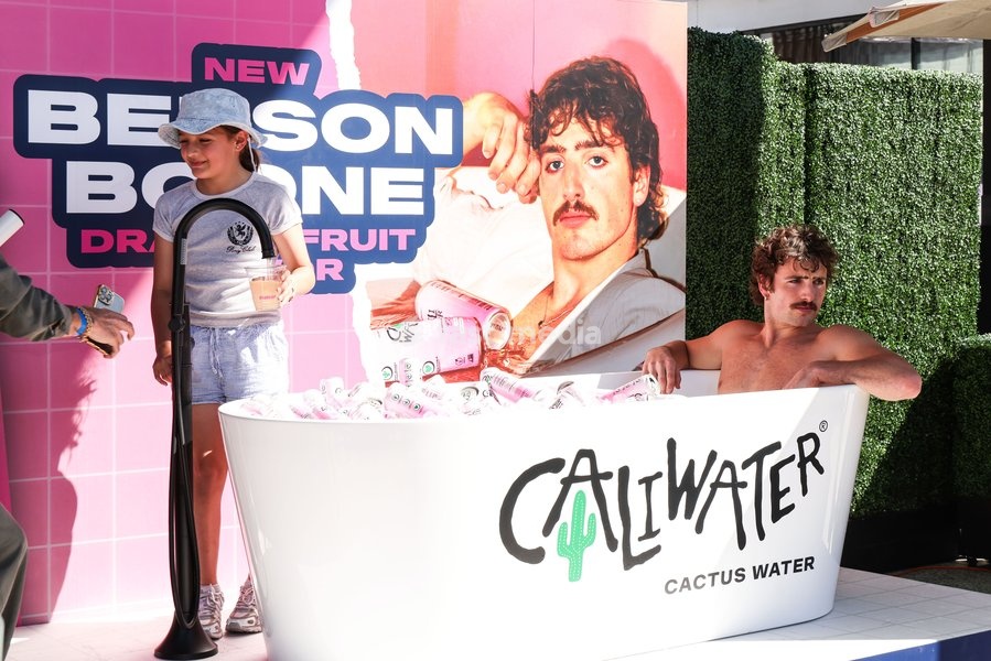 CENTURY CITY, LOS ANGELES, CALIFORNIA, USA - OCTOBER 18: Benson Boone attends his splash with a bathtub takeover celebrating Caliwater's New Dragon Fruit Flavor held at Westfield Century City on October 18, 2026 in Century City, Los Angeles, California, United States