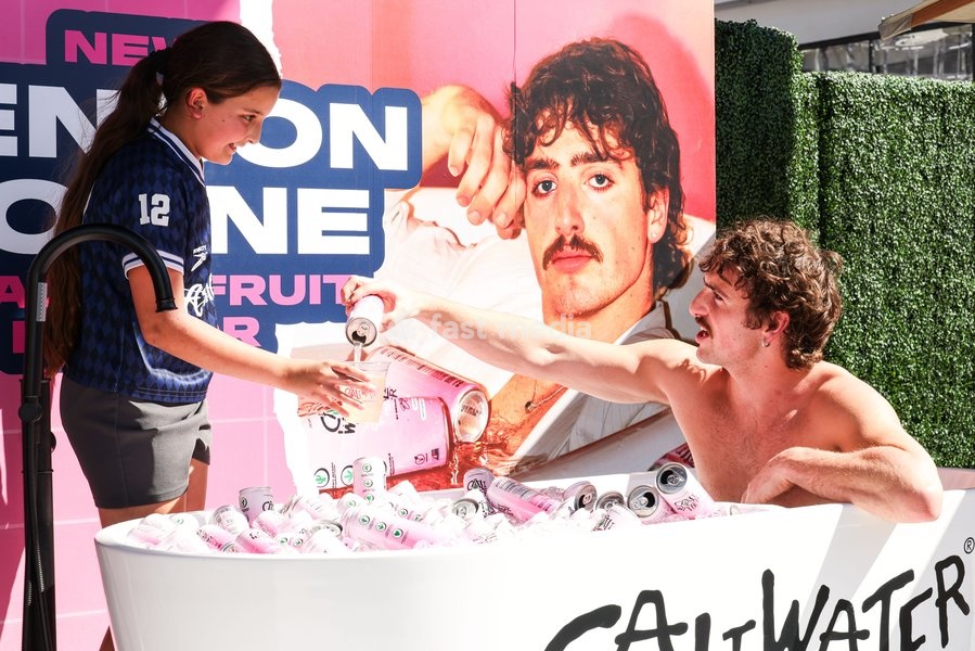CENTURY CITY, LOS ANGELES, CALIFORNIA, USA - OCTOBER 18: Benson Boone attends his splash with a bathtub takeover celebrating Caliwater's New Dragon Fruit Flavor held at Westfield Century City on October 18, 2026 in Century City, Los Angeles, California, United States