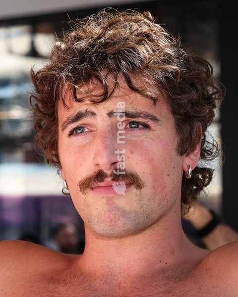 CENTURY CITY, LOS ANGELES, CALIFORNIA, USA - OCTOBER 18: Benson Boone attends his splash with a bathtub takeover celebrating Caliwater's New Dragon Fruit Flavor held at Westfield Century City on October 18, 2026 in Century City, Los Angeles, California, United States