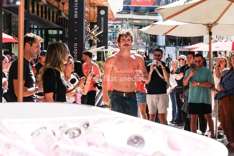 CENTURY CITY, LOS ANGELES, CALIFORNIA, USA - OCTOBER 18: Benson Boone attends his splash with a bathtub takeover celebrating Caliwater's New Dragon Fruit Flavor held at Westfield Century City on October 18, 2026 in Century City, Los Angeles, California, United States