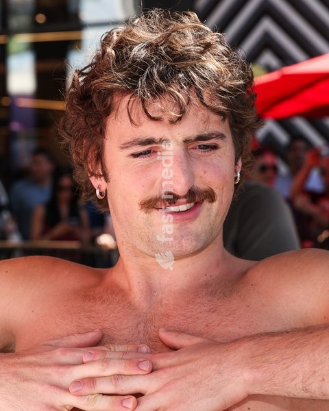 CENTURY CITY, LOS ANGELES, CALIFORNIA, USA - OCTOBER 18: Benson Boone attends his splash with a bathtub takeover celebrating Caliwater's New Dragon Fruit Flavor held at Westfield Century City on October 18, 2026 in Century City, Los Angeles, California, United States
