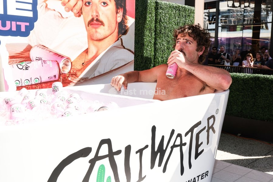 CENTURY CITY, LOS ANGELES, CALIFORNIA, USA - OCTOBER 18: Benson Boone attends his splash with a bathtub takeover celebrating Caliwater's New Dragon Fruit Flavor held at Westfield Century City on October 18, 2026 in Century City, Los Angeles, California, United States