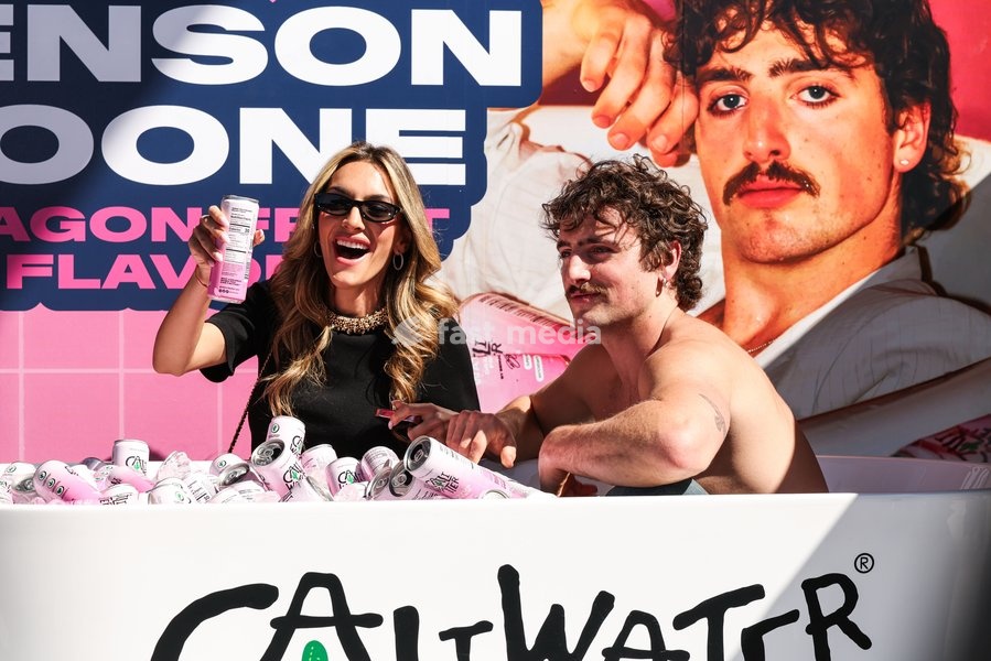 CENTURY CITY, LOS ANGELES, CALIFORNIA, USA - OCTOBER 18: Emily Austin and Benson Boone attend Benson Boone's splash with a bathtub takeover celebrating Caliwater's New Dragon Fruit Flavor held at Westfield Century City on October 18, 2026 in Century City, Los Angeles, California, United States