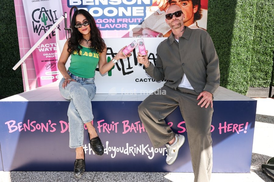 CENTURY CITY, LOS ANGELES, CALIFORNIA, USA - OCTOBER 18: Vanessa Hudgens and Oliver Trevena attend Benson Boone's splash with a bathtub takeover celebrating Caliwater's New Dragon Fruit Flavor held at Westfield Century City on October 18, 2026 in Century City, Los Angeles, California, United States