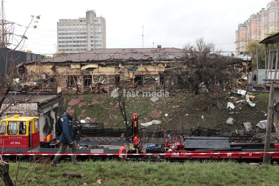 A man walks past a building near the Chernihivska metro station damaged by a Russian strike in Kyiv, Ukraine, on October 19, 2026. During the night and morning, Russia launched a strike on the capital with ballistic missiles, cruise missiles, and drones. According to the Kyiv City State…
