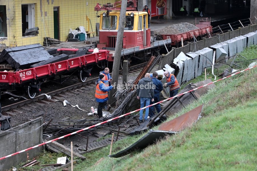 Repair workers restore cable networks near the Chernihivska metro station damaged by a Russian strike in Kyiv, Ukraine, on October 19, 2026. During the night and morning, Russia launched a strike on the capital with ballistic missiles, cruise missiles, and drones. According to the Kyiv City State…