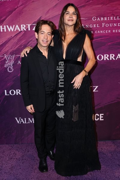 MANHATTAN, NEW YORK CITY, NEW YORK, USA - OCTOBER 19: Charlie Walk and Lauran Walk arrive at the 28th Annual Angel Ball Benefiting Gabrielle's Angel Foundation For Cancer Research held at Cipriani Wall Street on October 19, 2026 in Manhattan, New York City, New York, United States