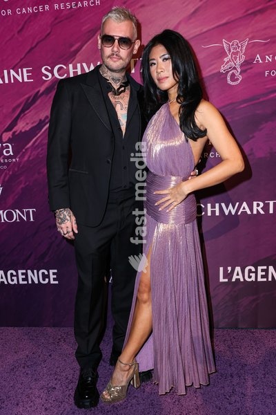 MANHATTAN, NEW YORK CITY, NEW YORK, USA - OCTOBER 19: Jason Naylor and Christina Lo arrive at the 28th Annual Angel Ball Benefiting Gabrielle's Angel Foundation For Cancer Research held at Cipriani Wall Street on October 19, 2026 in Manhattan, New York City, New York, United States