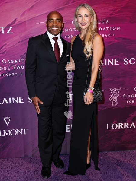 MANHATTAN, NEW YORK CITY, NEW YORK, USA - OCTOBER 19: Tiki Barber and Traci Lynn Johnson arrive at the 28th Annual Angel Ball Benefiting Gabrielle's Angel Foundation For Cancer Research held at Cipriani Wall Street on October 19, 2026 in Manhattan, New York City, New York, United States