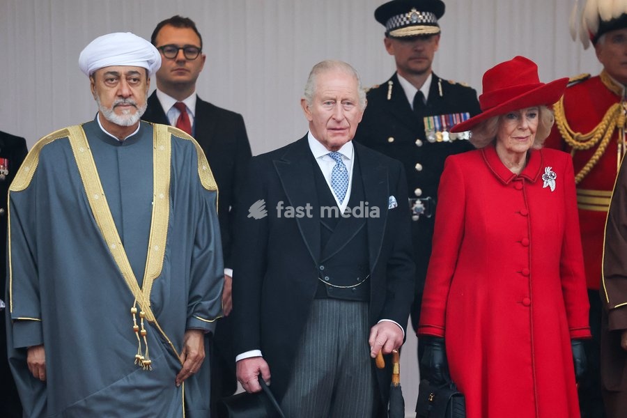 Britain's King Charles, Queen Camilla and Oman's Sultan Haitham bin Tariq pose for a photograph as they attend a welcome ceremony on the Royal Dais at Datchet Road during the Sultan's state visit to Britain, in Windsor, Britain, October 20, 2026