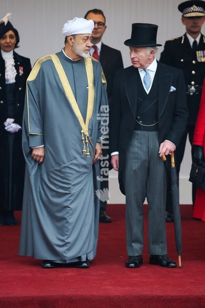 Britain's King Charles talks with Oman's Sultan Haitham bin Tariq during a welcome ceremony on the Royal Dais at Datchet Road on the Sultan's state visit to Britain, in Windsor, Britain, October 20, 2026