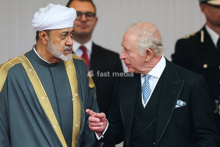 Britain's King Charles talks with Oman's Sultan Haitham bin Tariq as they attend a welcome ceremony on the Royal Dais at Datchet Road during the Sultan's state visit to Britain, in Windsor, Britain, October 20, 2026