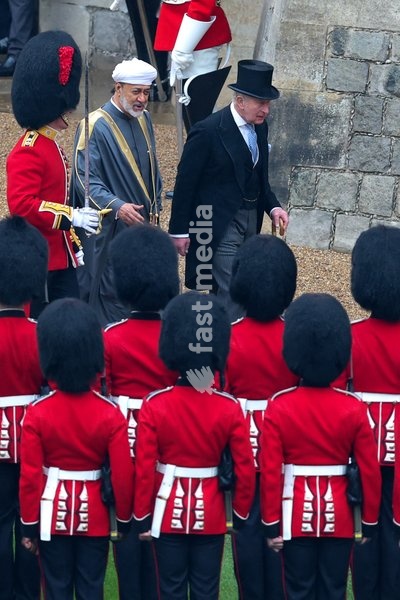 WINDSOR, ENGLAND - OCTOBER 20: The Sultan of Oman Haitham bin Tariq Al Said and King Charles III inspect the Guard of Honour in Quadrangle of Windsor Castle during the State Visit of the Sultan Of Oman to the UK on October 20, 2026 in Windsor, England. Sultan Haitham bin Tarik, Sultan of Oman, is…
