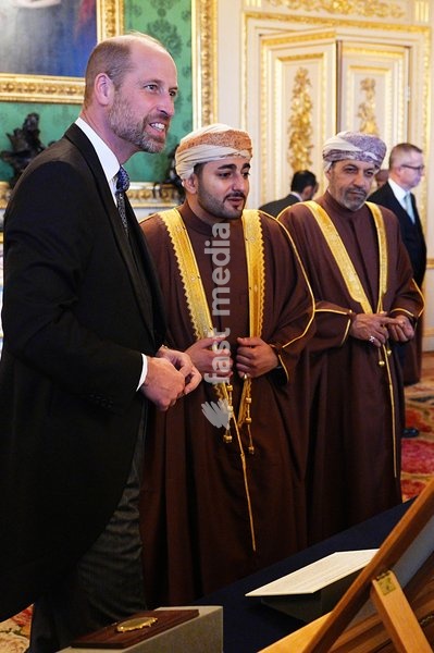 The Prince of Wales (left) with members of the Oman delegation viewing a display of items from the Royal Collection in the Green Drawing Room at Windsor Castle, Berkshire, during the Sultan of Oman, Sultan Haitham bin Tarik al Said's state visit to the UK. Picture date: Tuesday October 20, 2026. PA…