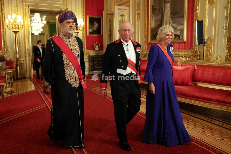 Britain's King Charles, Queen Camilla and Oman's Sultan Haitham bin Tariq walk to attend a State Banquet at Windsor Castle during the Sultan's state visit to Britain, in Windsor, Britain, October 20, 2026