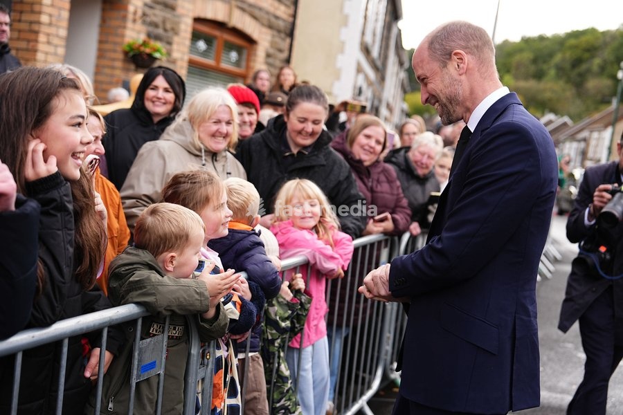 The Prince of Wales speaks to members of the public lining the streets outside Aberfan Memorial Garden, where survivors, bereaved parents and members of the community are paying tribute to the 144 people who lost their lives in the Aberfan disaster on October 21 1966. Picture date: Wednesday…