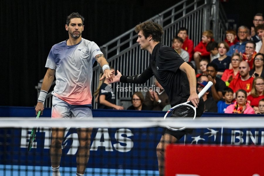 Guido Pella of Argentina, Manuel Guinard of France pictured in action during the European Open ATP tennis tournament in Brussels, on 21 October. This year's edition of the tournament is taking place from 17 to 25 October