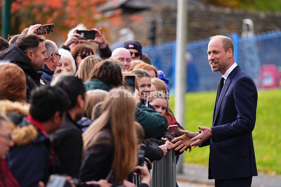 The Prince of Wales speaks to members of the public lining the streets outside Aberfan Memorial Garden, where survivors, bereaved parents and members of the community are paying tribute to the 144 people who lost their lives in the Aberfan disaster on October 21 1966. Picture date: Wednesday…