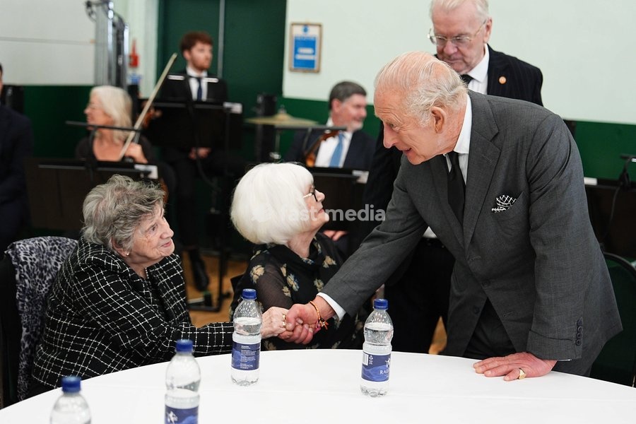 King Charles III speaks with members of the Aberfan Wives Group at Aberfan and Merthyr Vale Community Centre, during a visit to Aberfan to meet survivors, bereaved parents and members of the community and pay tribute to the 144 people who lost their lives in the Aberfan disaster on October 21 1966.…