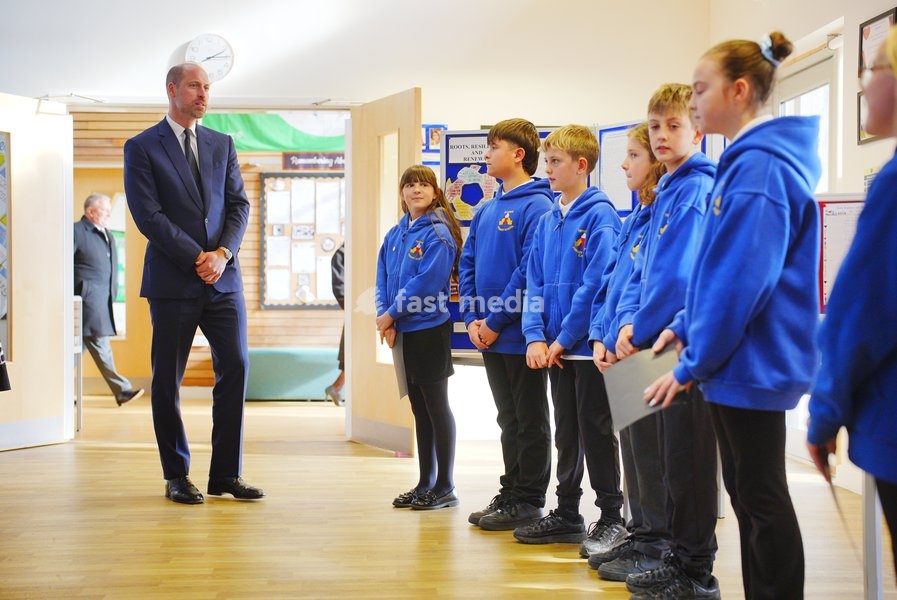 The Prince of Wales with students during his visit to Ynysowen Community Primary School to unveil the Aberfan Memorial Tree as he pays tribute to the 144 people who lost their lives in the Aberfan disaster on October 21 1966. Picture date: Wednesday October 21, 2026