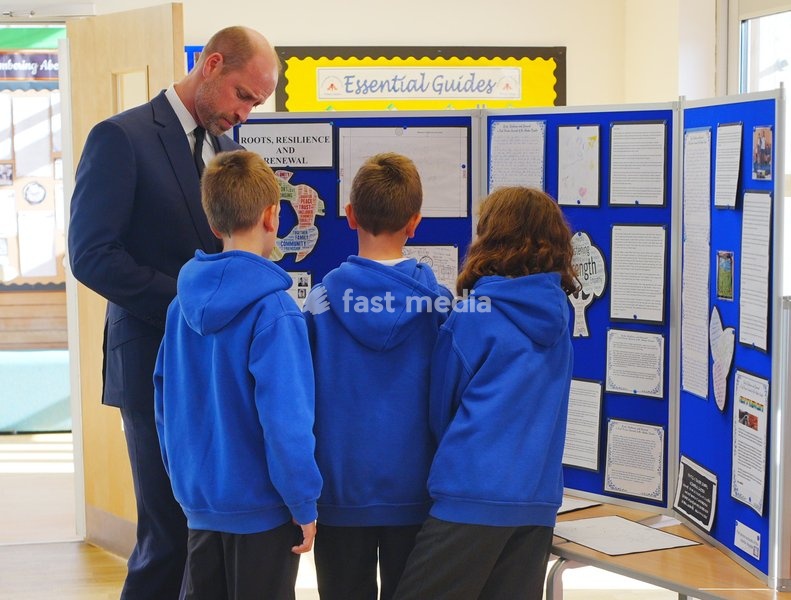 The Prince of Wales with students during his visit to Ynysowen Community Primary School to unveil the Aberfan Memorial Tree as he pays tribute to the 144 people who lost their lives in the Aberfan disaster on October 21 1966. Picture date: Wednesday October 21, 2026