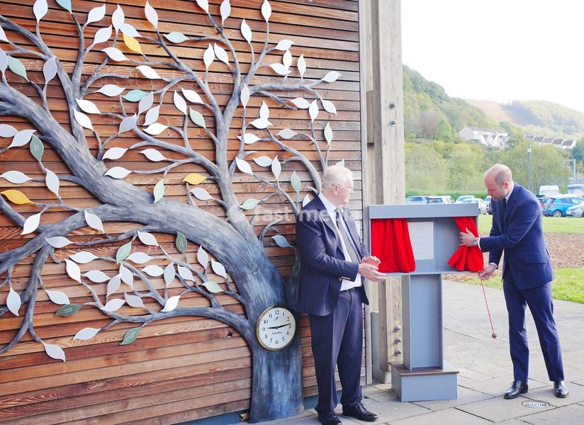 The Prince of Wales reveals a plaque during his visit to Ynysowen Community Primary School to unveil the Aberfan Memorial Tree as he pays tribute to the 144 people who lost their lives in the Aberfan disaster on October 21 1966. Picture date: Wednesday October 21, 2026