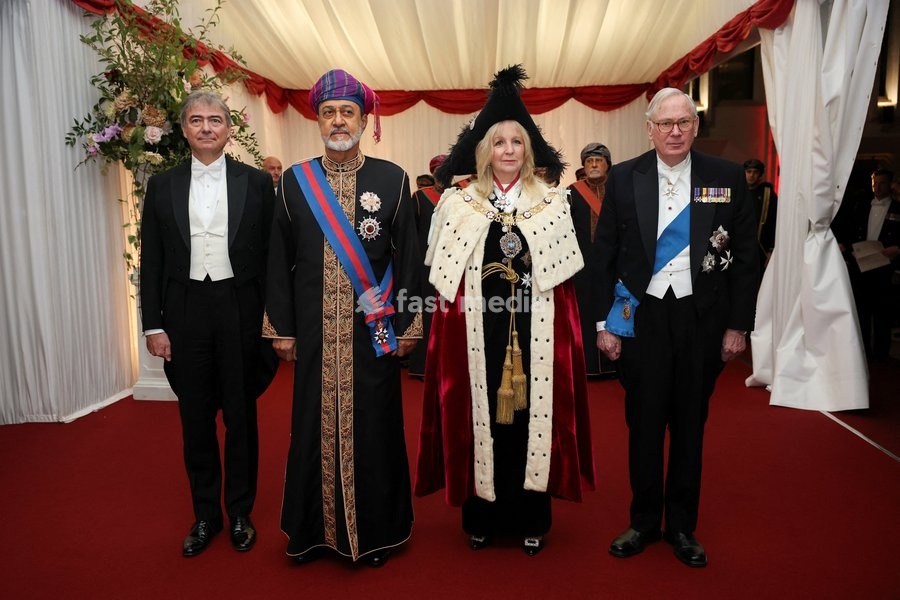 Oman's Sultan Haitham bin Tariq, Lady Mayor of the City of London Dame Susan Langley and Prince Richard, Duke of Gloucester pose as they attend the Guildhall State Banquet during the Sultan's state visit to Britain, in London, October 21, 2026
