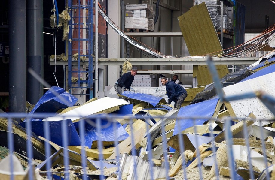 Workers remove the rubble at an Epicentr K home improvement hypermarket in the Obolonskyi district damaged by a Russian attack, Kyiv, Ukraine, October 22, 2026. On Thursday night, Russian forces struck the Ukrainian capital with ballistic missiles and drones. According to the Kyiv City Military…