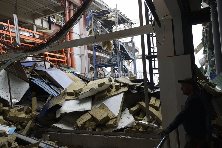 Workers remove the rubble at an Epicentr K home improvement hypermarket in the Obolonskyi district damaged by a Russian attack, Kyiv, Ukraine, October 22, 2026. On Thursday night, Russian forces struck the Ukrainian capital with ballistic missiles and drones. According to the Kyiv City Military…