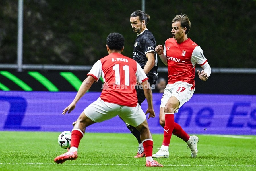 Christian Burgess of KAA Gent and Jovan Milosevic of SC Braga pictured in action during a soccer game between Portuguese SC Braga and Belgian soccer team KAA Gent, Thursday 22 October 2026 in Braga, Portugal, the second match in the UEFA Conference League league phase