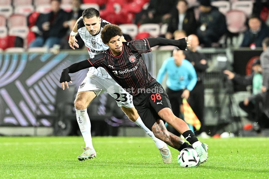 STVV's Joedrick Pupe and Midtjylland's David Matinez pictured in action during a soccer game between Danish FC Midtjylland and Belgian Sint-Truidense VV, Thursday 22 October 2026 in Herning, Denmark, on the second day of the UEFA Conference League league phase