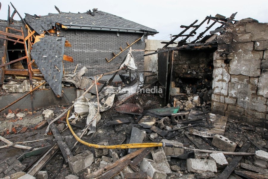A residential area is damaged by a Russian attack in Dnipro, Ukraine, October 22, 2026. According to city head Borys Filatov, 11 private houses were damaged in the strike on Thursday morning, and one home burned down completely