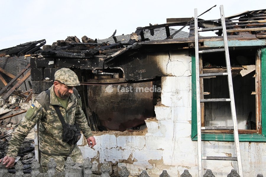 A man walks past a fire-stricken house after a Russian attack on a residential area in Dnipro, Ukraine, October 22, 2026. According to city head Borys Filatov, 11 private houses were damaged in the strike on Thursday morning, and one home burned down completely