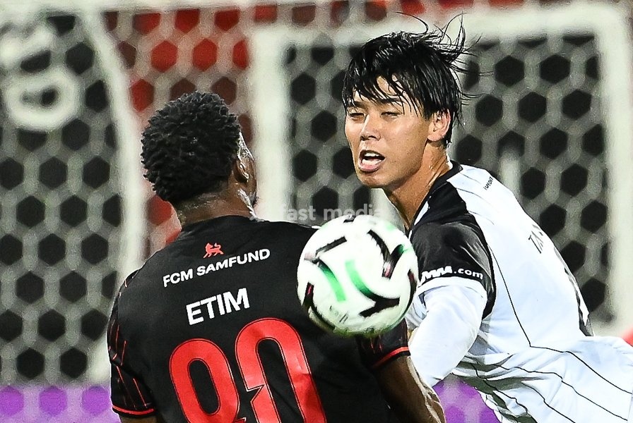 Midtjylland's Friday Etim and STVV's Kota Takai pictured in action during a soccer game between Danish FC Midtjylland and Belgian Sint-Truidense VV, Thursday 22 October 2026 in Herning, Denmark, on the second day of the UEFA Conference League league phase