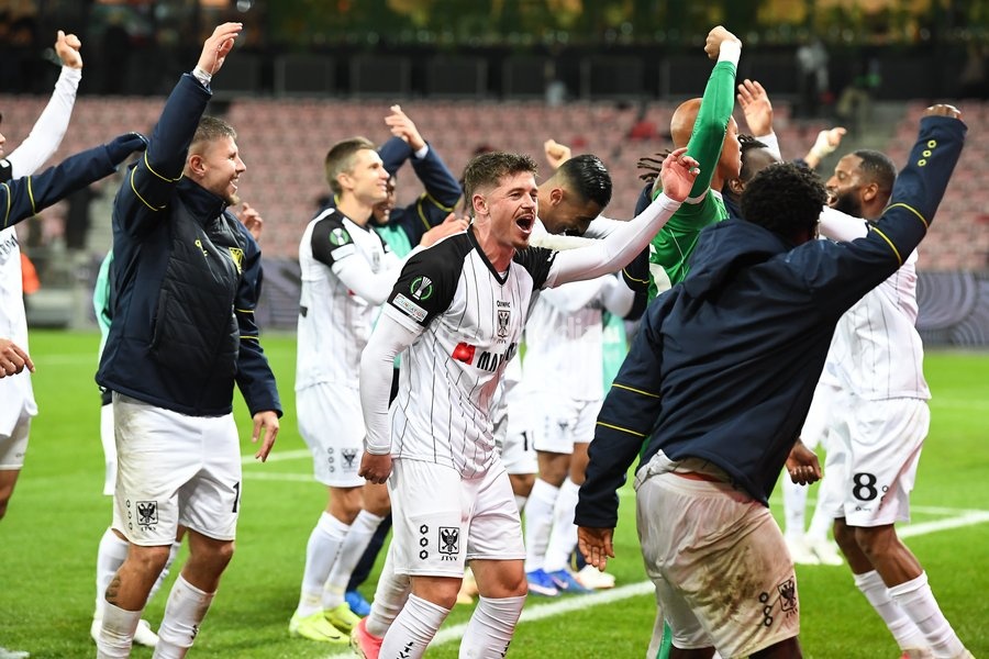 STVV's players celebrate after winning a soccer game between Danish FC Midtjylland and Belgian Sint-Truidense VV, Thursday 22 October 2026 in Herning, Denmark, on the second day of the UEFA Conference League league phase