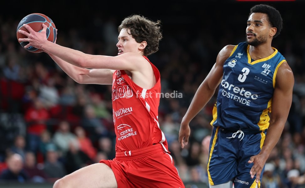 Spirou's Jules Rotsaert and Oostende's Stephan Swenson fights for the ball during a basketball match between Spirou Charleroi and BC Oostende, Friday 23 October 2026 in Charleroi, on day 4 of the 'BNXT League' Belgian and Dutch first division basket championship