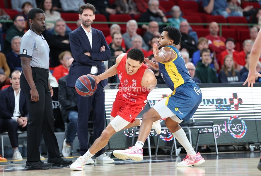 Spirou's Adedayo Polet and Oostende's Stephan Swenson fight for the ball during a basketball match between Spirou Charleroi and BC Oostende, Friday 23 October 2026 in Charleroi, on day 4 of the 'BNXT League' Belgian and Dutch first division basket championship