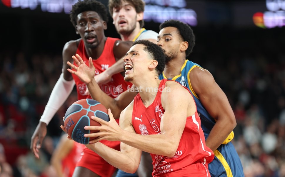 Spirou's Adedayo Polet and Oostende's Stephan Swenson fight for the ball during a basketball match between Spirou Charleroi and BC Oostende, Friday 23 October 2026 in Charleroi, on day 4 of the 'BNXT League' Belgian and Dutch first division basket championship