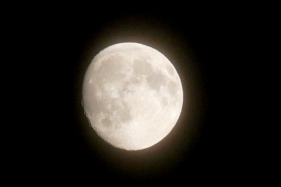 The waxing gibbous moon rises on a stormy night in the countryside. Visible at 92.7% This intermediate Moon phase starts after the First Quarter Moon and lasts until the Full Moon