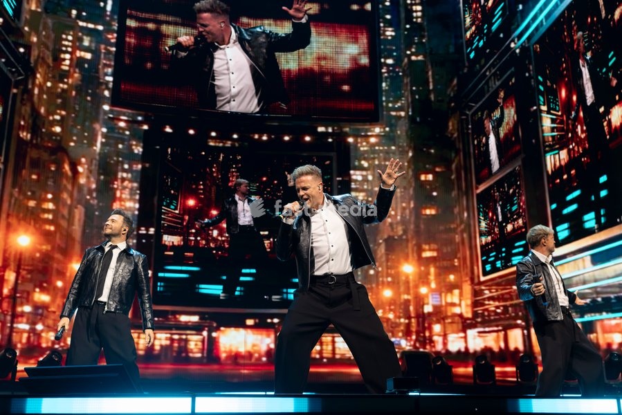 Nicky Byrne, Shane Filan and Kian Egan of Westlife perform at Co-Op Live, Manchester, England, 23rd October 2026 as part of the Westlife 25th Anniversary Tour