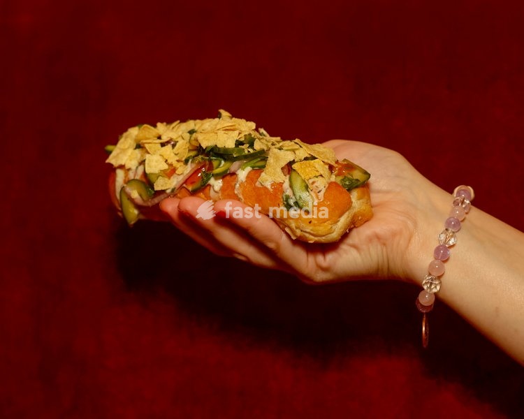 Currywurst Hot Dog with curry ketchup, mango chutney, raita, kachumber and poppadom at Altar in Leytonstone, London, United Kingdom