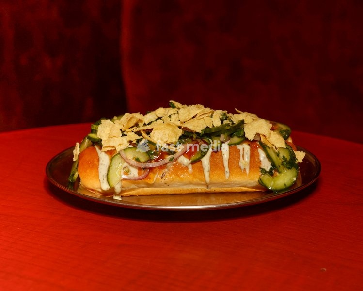 Currywurst Hot Dog with curry ketchup, mango chutney, raita, kachumber and poppadom at Altar in Leytonstone, London, United Kingdom
