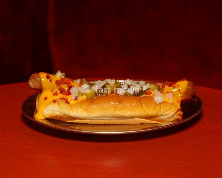 Chilli Bacon Cheese Hot Dog with nacho cheese, bacon, jalapeño, gherkin and onion at Altar in Leytonstone, London, United Kingdom