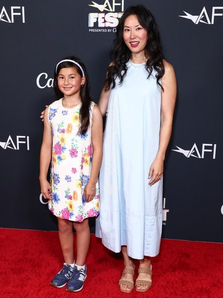 HOLLYWOOD, LOS ANGELES, CALIFORNIA, USA - OCTOBER 24: Mason Reeves and mother arrive at the 2026 AFI (American Film Institute) Fest Presented By Canva - Special Screening Of Sumerian Pictures' 'Josephine' held at TCL Chinese 6 Theatres at Ovation Hollywood on October 24, 2026 in Hollywood, Los…