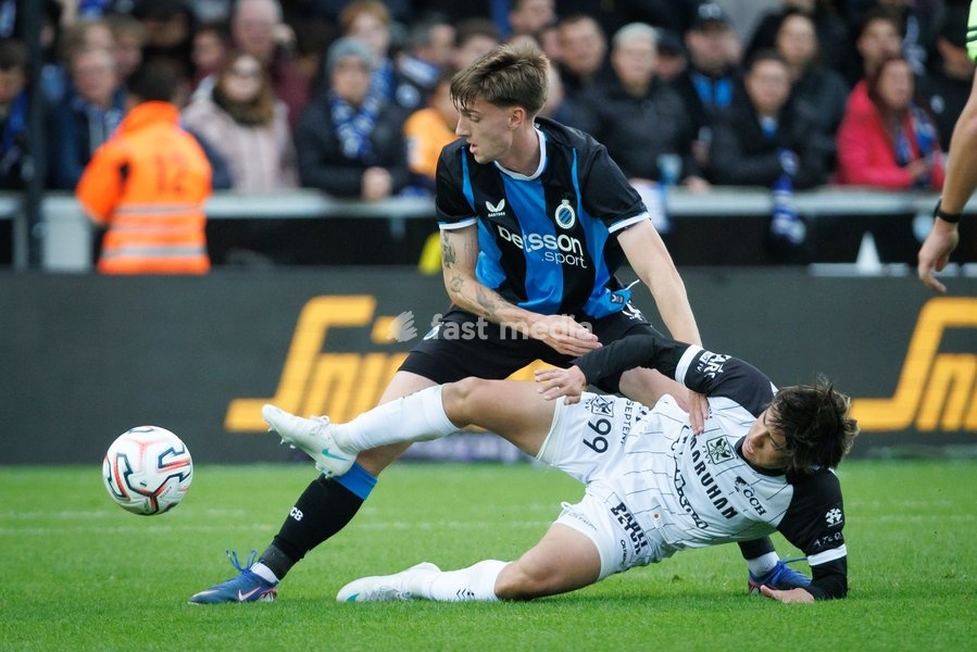 Club's Jorne Spileers and STVV's Shinkawa Shion fight for the ball during a soccer match between Club Brugge and Sint-Truidense VV , Sunday 25 October 2026 in Brugge, on day 9 of the 2026-2027 'Jupiler Pro League' first division of the Belgian championship