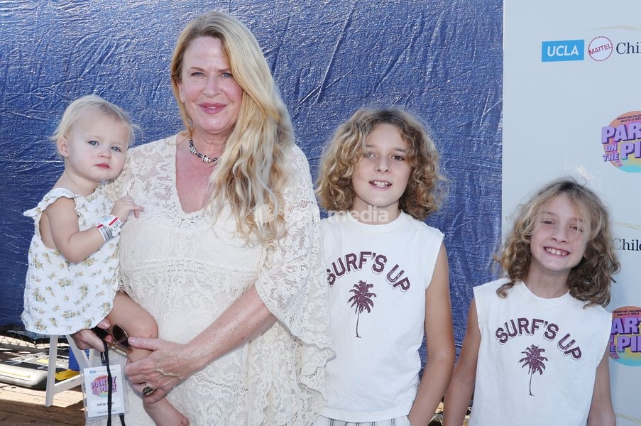 25 October 2025 - Santa Monica, California - Hendrix George, Marley George, Amy Boatwright, Jagger George. Attend 26th Annual Party on the Pier Benefiting UCLA Mattel Children's Hospital at Santa Monica Pier held at Pacific Park - Santa Monica Pier, in Santa Monica