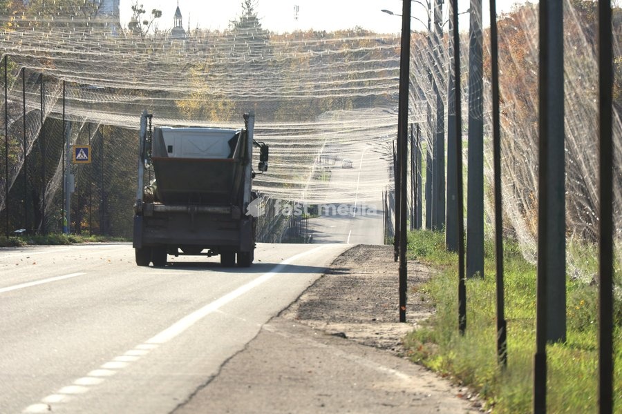 A truck drives along a road covered with an anti-drone net, Kharkiv, Ukraine, October 24, 2026. Anti-drone nets are being installed to protect civilians and vehicles from Russian UAV strikes